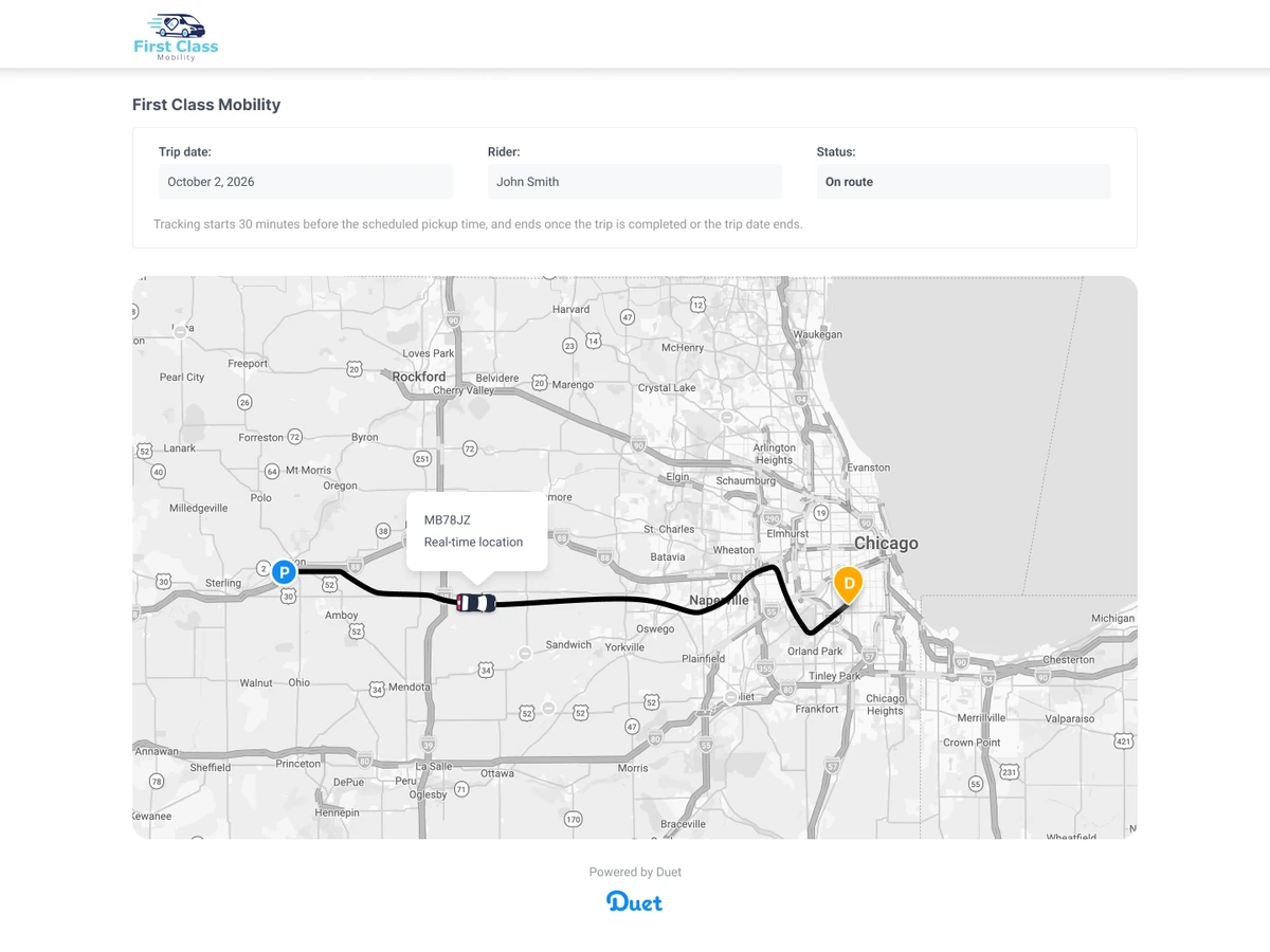 Duet live tracking page for a First Class Mobility ride: a map of northern Illinois shows the van’s real-time location on its route between the pickup and the drop-off in Chicago.